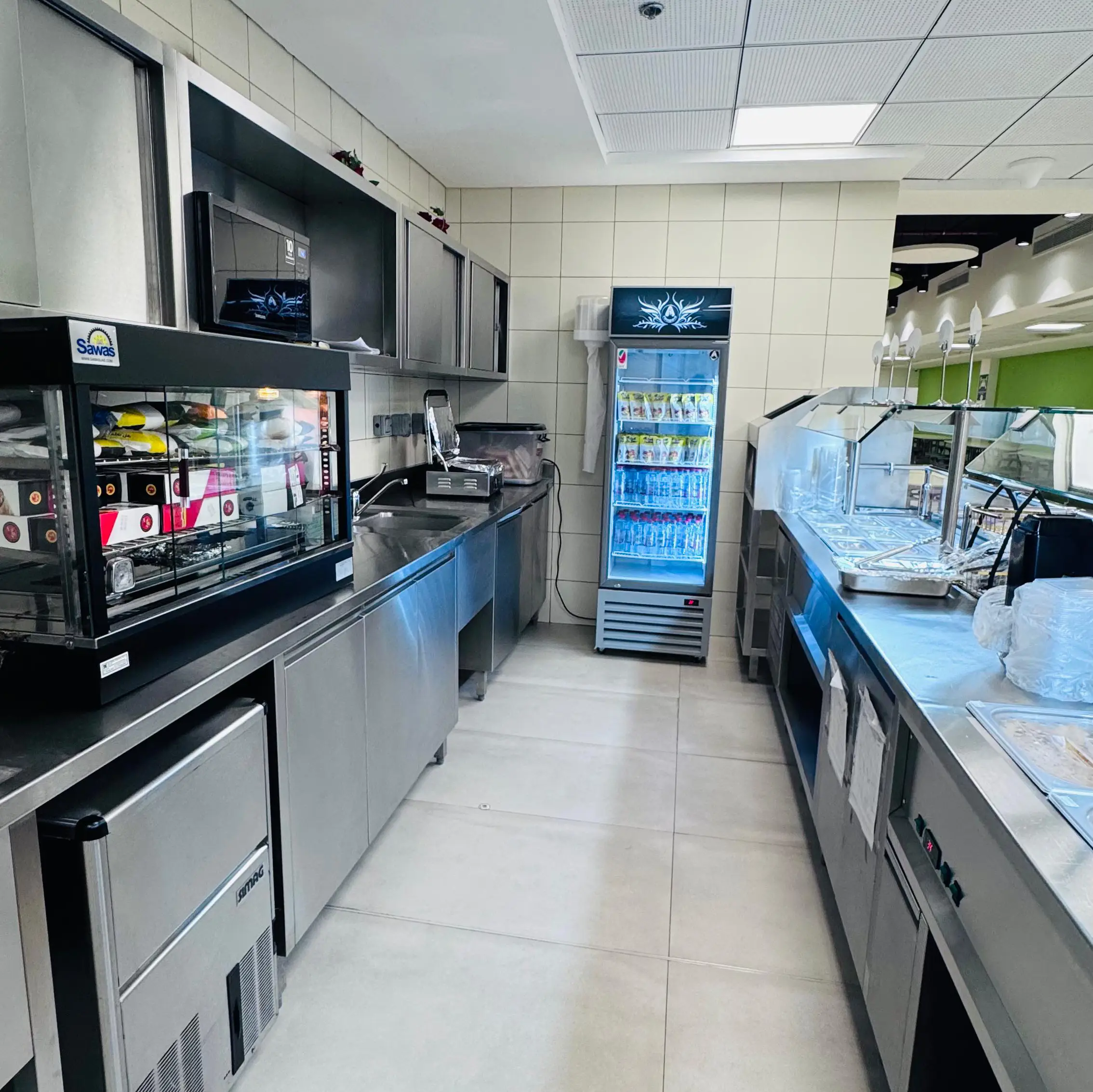 School canteen kitchen with refrigerated displays